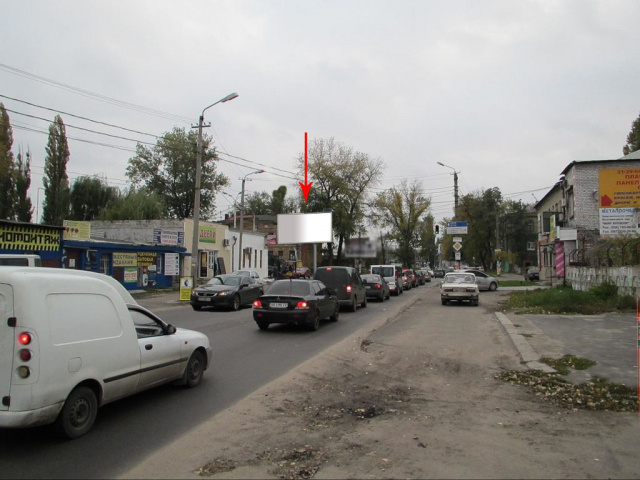 Щит 6x3,  120Б,вул. Павлова - вул Ак. Белюбського (Краснозаводська), біля світлофору, рух до автовокзалу